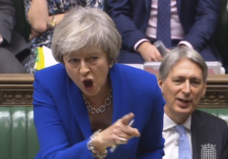 Britain&#039;s Prime Minister Theresa May gestures as she speaks during the weekly Prime Minister&#039;s Questions in the House of Commons, London, Wednesday Dec. 19, 2018. With 100 days until Britain ...