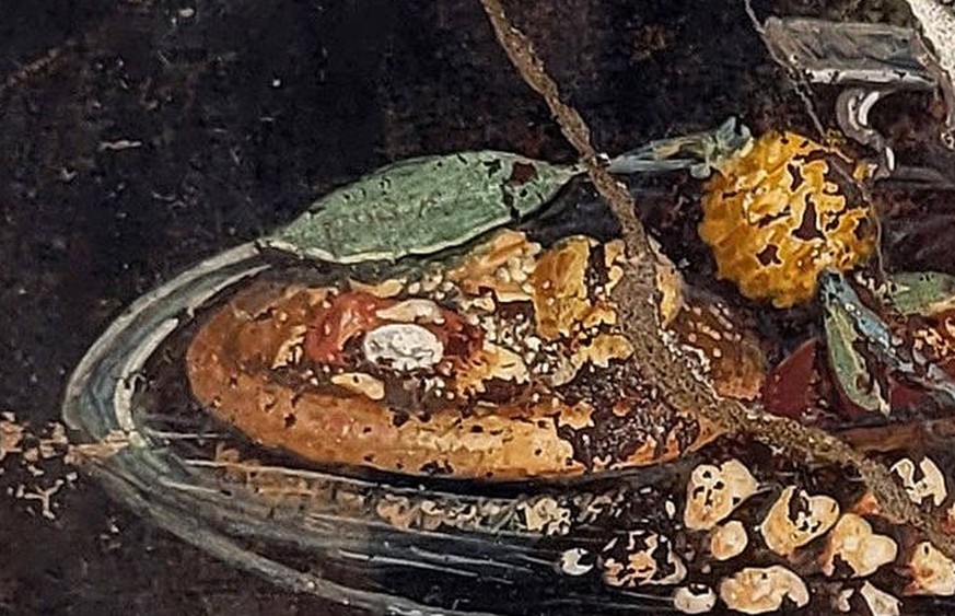 22.06.2023 Pompeii - Discovery Of A Still Life Painting With Pizza Ancestor Discovery of a still life from the new excavations in Pompeii, Italy on June 2023. It looks like a pizza, on this Pompeian p ...