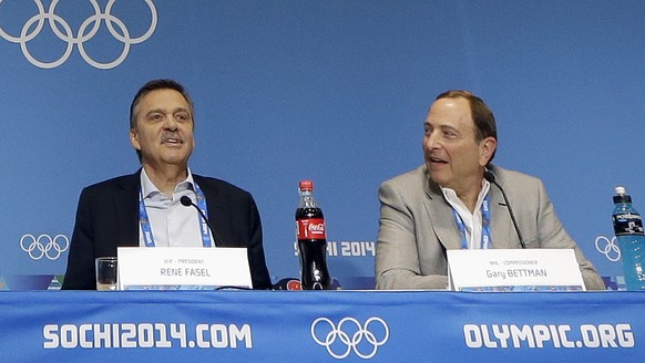 Graham Parks, left, moderates a news conference with NHL Players&#039; Association Executive Director Don Fehr, second from left; International Ice Hockey Federation President Rene Fasel; second from  ...