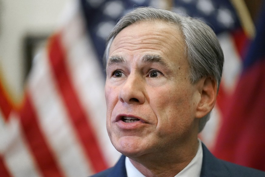 FILE - In this Tuesday, June 8, 2021, file photo, Texas Gov. Greg Abbott speaks at a news conference in Austin, Texas. Abbott, who faces a contested reelection primary next year, is pushing looser gun ...