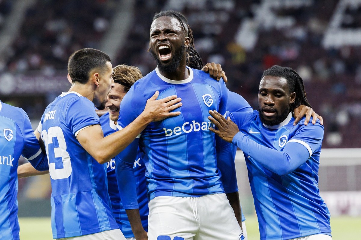 Genk&amp;#039;s forward Toluwalase Arokodare, centre, celebrates his goal with his teammates after scoring the 0:1, during the UEFA Champions League Second qualifying round first leg soccer match betw ...