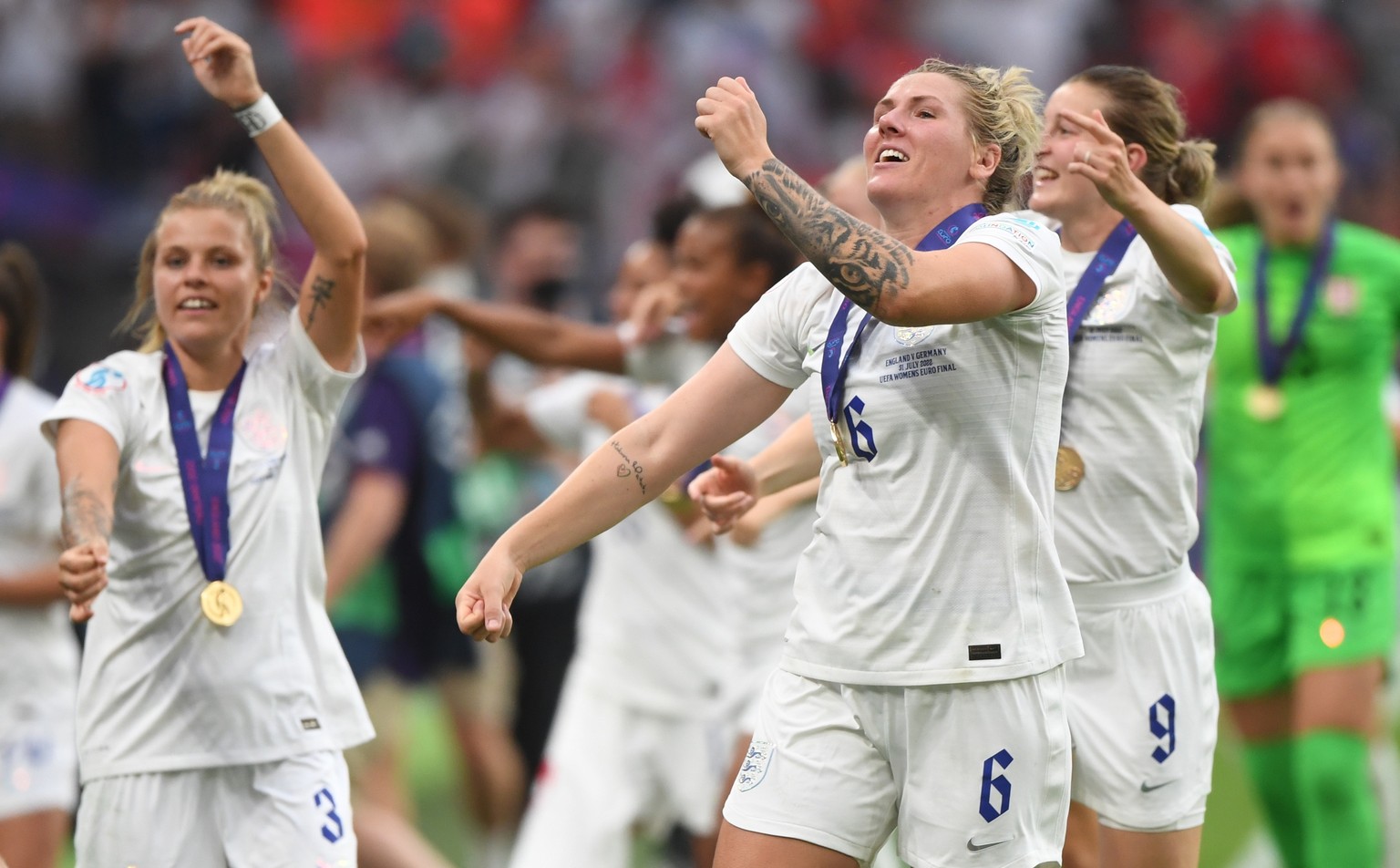epa10100768 England&#039;s Millie Bright (R) celebrates after the UEFA Women&#039;s EURO 2022 final between England and Germany at Wembley in London, Britain, 31 July 2022. EPA/Neil Hall