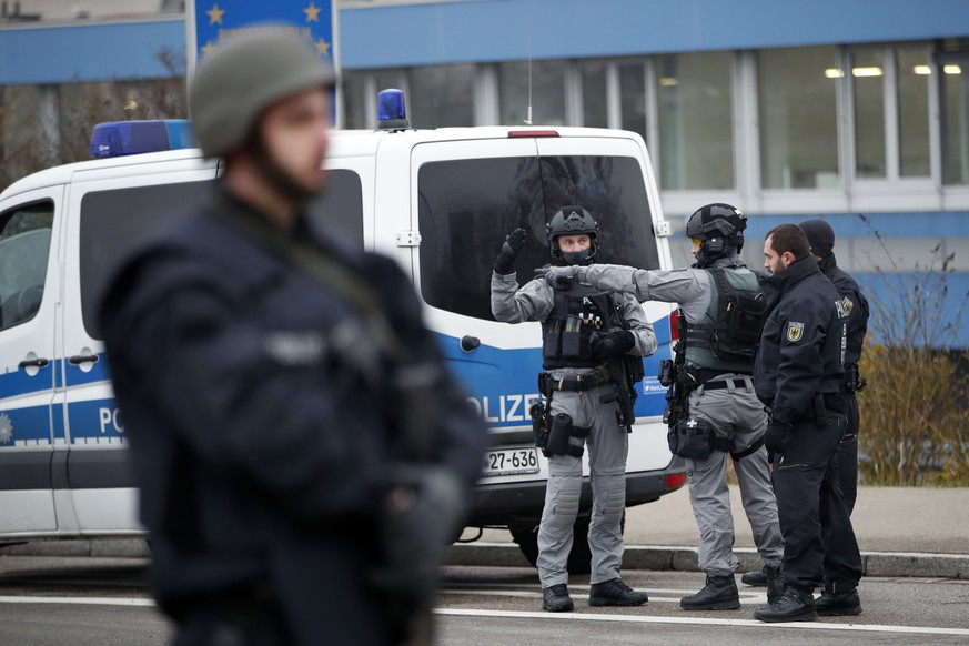 German police officers patrol at the French-German border following a shooting in Strasbourg, eastern France, Wednesday, Dec. 12, 2018. A man who had been flagged as a possible extremist sprayed gunfi ...