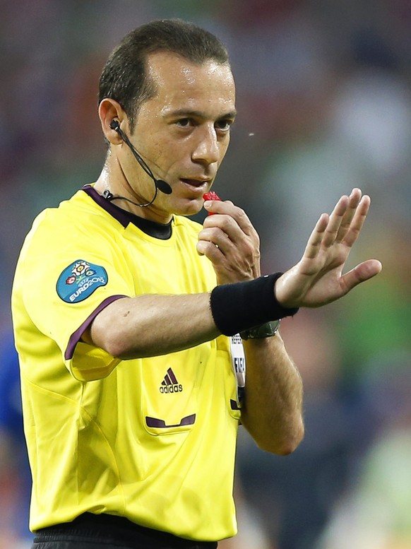 epa04113732 FIFA WORLD CUP 2014 REFEREES

Picture taken on 18 June 2012 shows Turkish referee Cuneyt Cakir during the Group C preliminary round match of the UEFA EURO 2012 between Italy and Ireland in ...