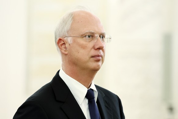 epa12046909 Russian Direct Investment Fund CEO Kirill Dmitriev waits before a meeting of Russian President Vladimir Putin and Sultan of Oman Haitham bin Tariq Al-Said at the Kremlin in Moscow, Russia, ...