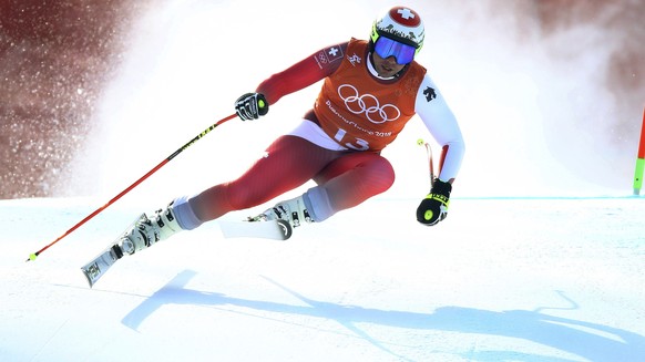 Switzerland's Beat Feuz competes in men's downhill training at the 2018 Winter Olympics in Jeongseon, South Korea, Friday, Feb. 9, 2018. (AP Photo/Alessandro Trovati)