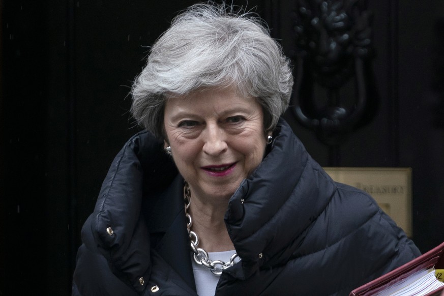 epa07555316 British Prime Minister Theresa May leaves 10 Downing Street to attend Prime Ministers Questions (PMQs) at the House of Commons, Central London, Britain, 08 May 2019. EPA/WILL OLIVER