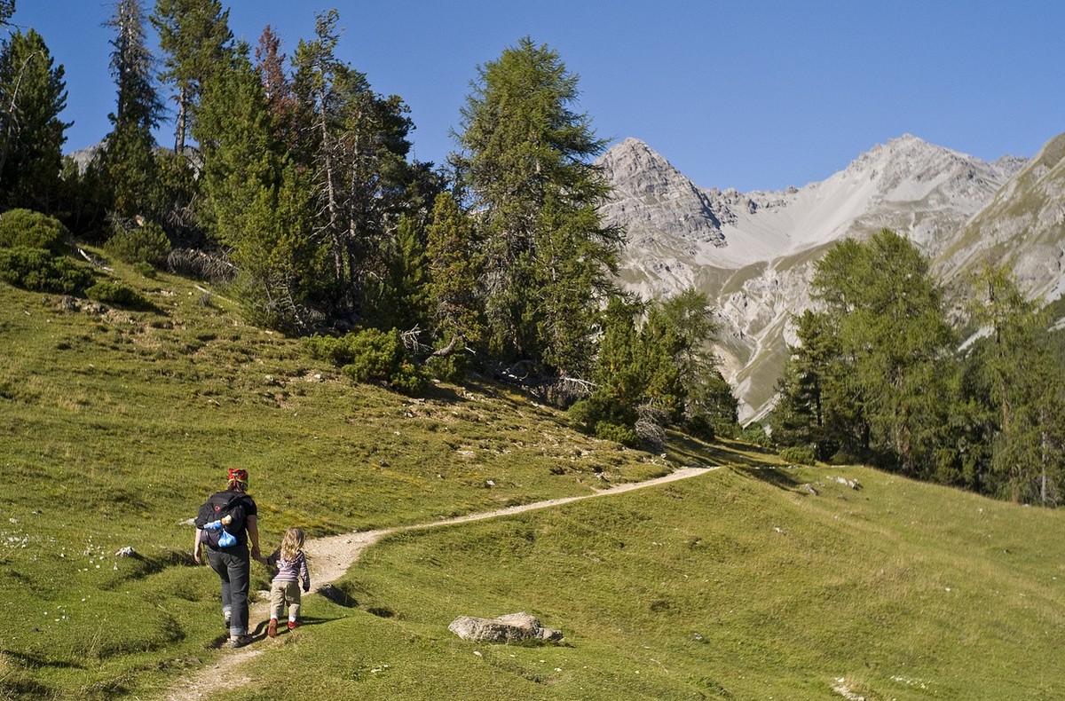 A woman and a child walk along a path in the Swiss National Park near Il Fuorn, pictured on September 2, 2008. The Swiss National Park in the Engadine valley in the canton of Grisons encompasses 170 s ...