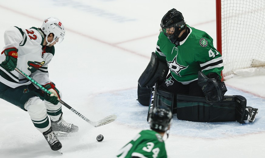 Minnesota Wild forward Kevin Fiala (22) shoots the puck past Dallas Stars goaltender Scott Wedgewood (41) for a goal during the first period of an NHL hockey game Thursday, April 14, 2022, in Dallas.  ...