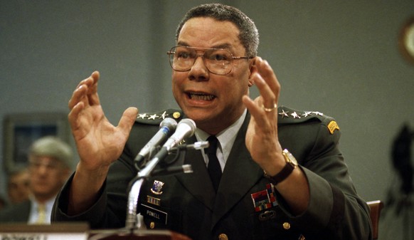 FILE - In this Sept. 25, 1991, file photo, Gen. Colin Powell, chairman of the Joint Chiefs of Staff, gestures on Capitol Hill in Washington, at a House Armed Services subcommittee. Powell was the firs ...