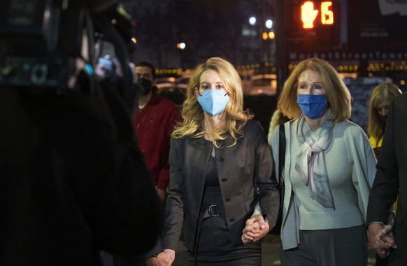 Elizabeth Holmes leaves federal court after the verdict in San Jose, Calif., Monday, Jan. 3, 2022. Holmes was convicted of fraud for turning her blood-testing startup Theranos into a sophisticated sha ...
