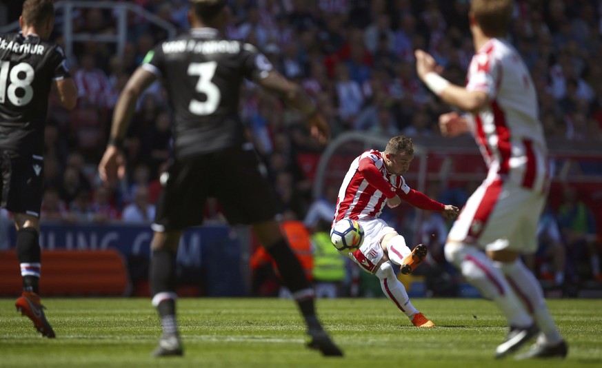 Stoke City&#039;s Xherdan Shaqiri scores his side&#039;s first goal of the game, during the English Premier League soccer match between Stoke City and Crystal Palace, at the bet365 Stadium, in Stoke,  ...
