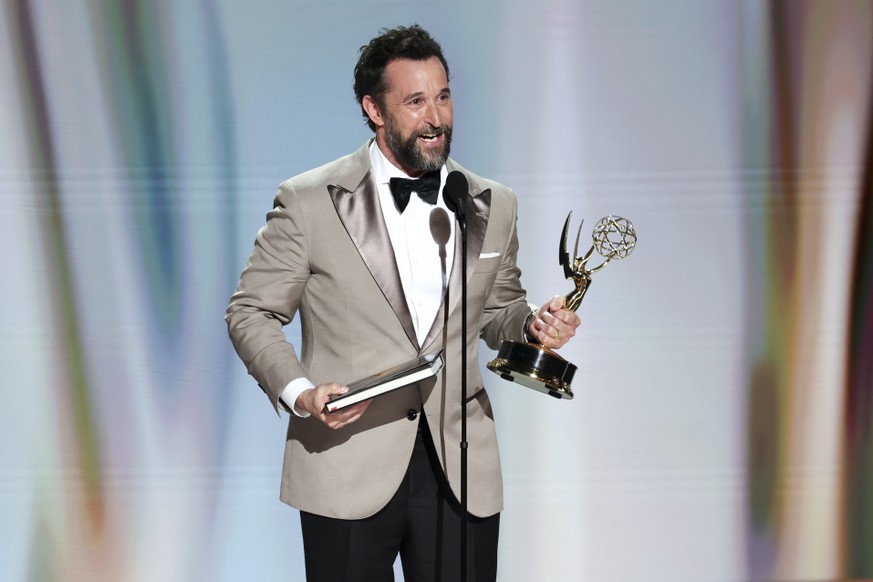 epa13240422 Noah Wyle accepts the Outstanding Lead Actor in a Drama Series Award for 'The Pitt' onstage during the 78th annual Emmy Awards ceremony held at the Peacock Theater in Los Angeles ...