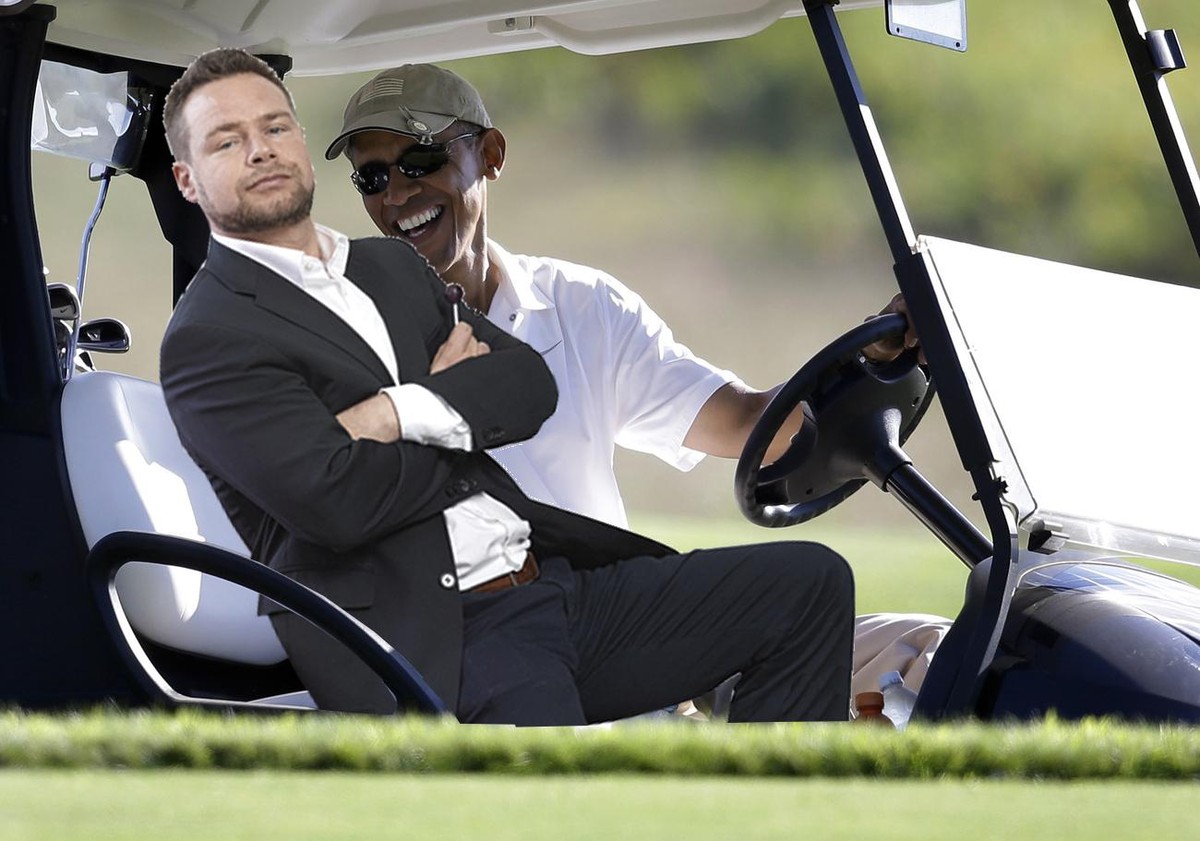 FILE - This Aug. 20, 2014 file photo shows President Barack Obama smiling at the wheel of a golf cart during golfing at Vineyard Golf Club in Edgartown, Mass., on the island of Martha's Vineyard. ...