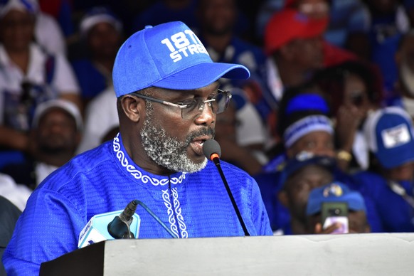 epa10847147 Liberian President George Weah, the candidate of the governing Coalition for Democratic (CDC) party addresses supporters during official launch of re-election campaign at the Antoinette Tu ...