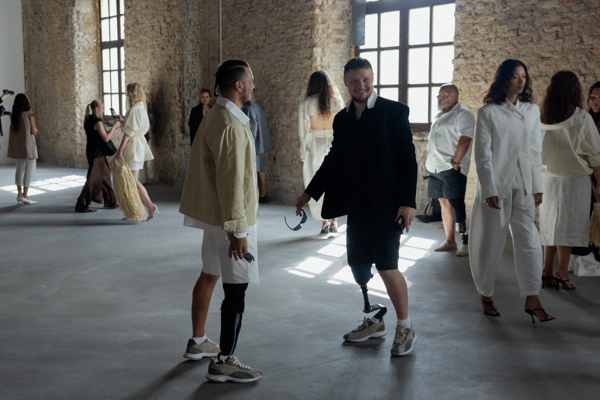 Ukrainian veterans walk down the runway during the Sidletskiy fashion show in collaboration with the U+System Military Prosthetics Center during Ukrainian Fashion Week in Kyiv on September 6, 2026, am ...