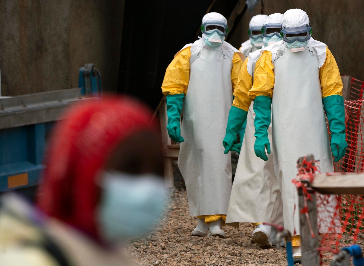 FILE - Health workers dressed in protective gear begin their shift at an Ebola treatment center in Beni, Congo, July 16, 2019. (AP Photo/Jerome Delay, File)
Congo Ebola