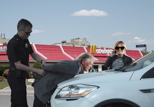 TORONTO, CANADA - 26TH JUNE 2014: The outside of a McDonalds drive through restaurant during the day