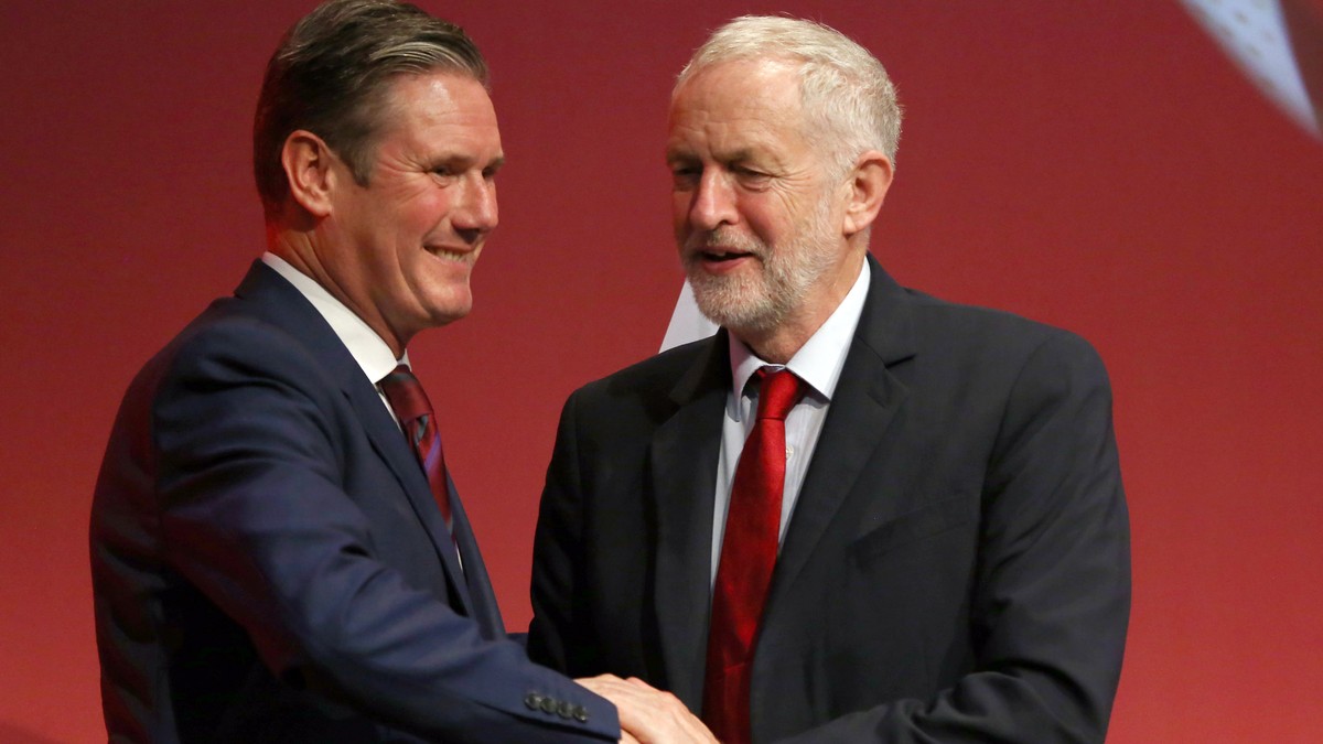 epa08342489 (FILE) - Britain's opposition Labour Party then Spokesperson for Exiting the EU, Keir Starmer (L) is congratulated following his speech by then party leader Jeremy Corbyn (R) at the L ...