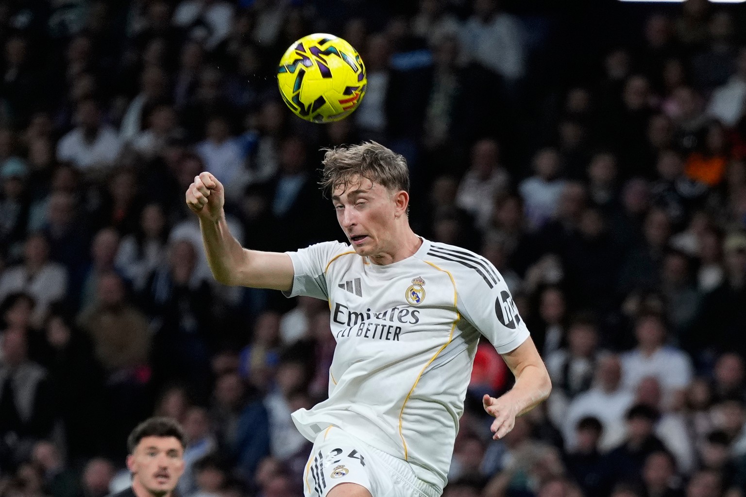 Real Madrid's Dean Huijsen scores his side's third goal during a Spanish La Liga soccer match between Real Madrid and Elche CF, in Madrid, Saturday, March 14, 2026. (AP Photo/Manu Fernandez) ...
