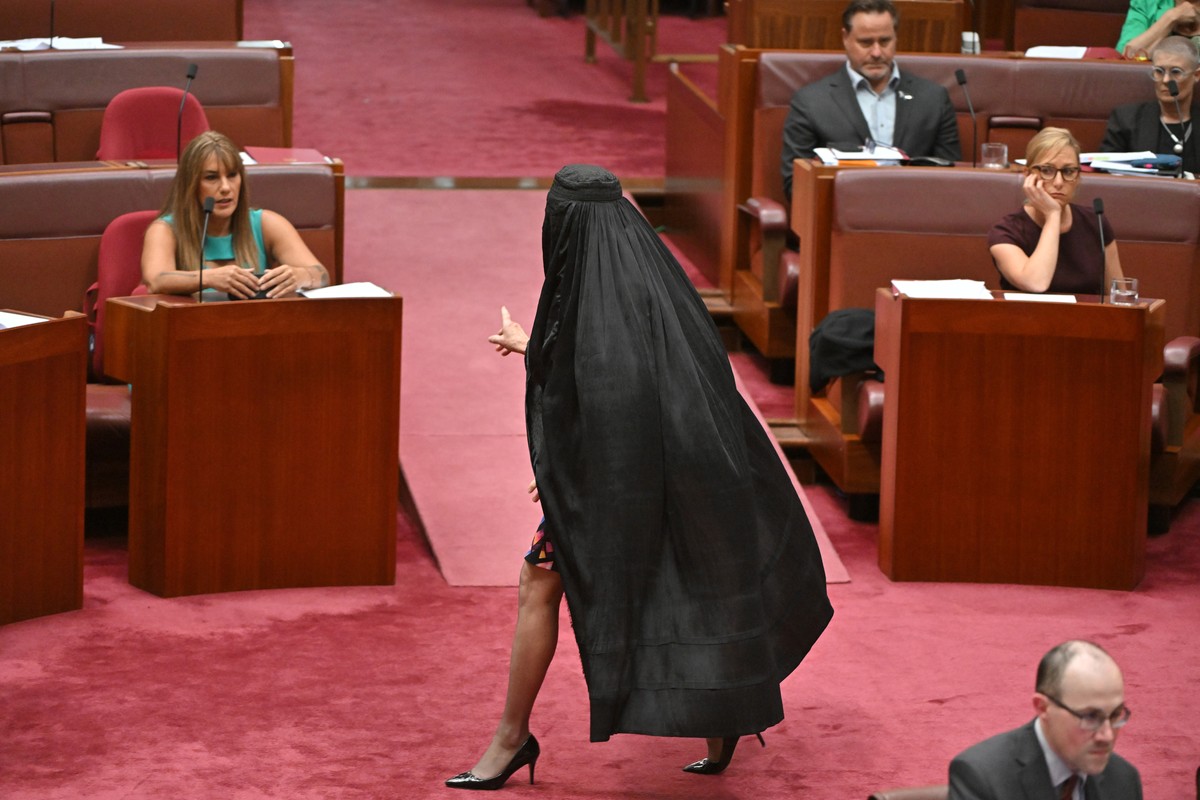 One Nation Leader Pauline Hanson wears a burqa in the Senate chamber at Parliament House in Canberra, Monday, Nov. 24, 2025. (Mick Tsikas/AAP Image via AP)
Australia Hanson