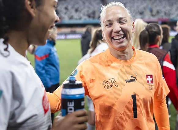 Switzerland&#039;s goalkeeper Gaelle Thalmann, center, and Switzerland&#039;s midfielder Coumba Sow, left, react after the FIFA Women&#039;s World Cup 2023 soccer match between Switzerland and Philipp ...