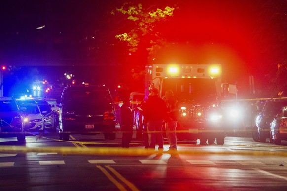 epaselect epa12124446 Police officers on the scene where two people were shot and killed near the Capital Jewish Museum in Washington, DC, USA, 22 May 2025. According to a social media post by the US  ...