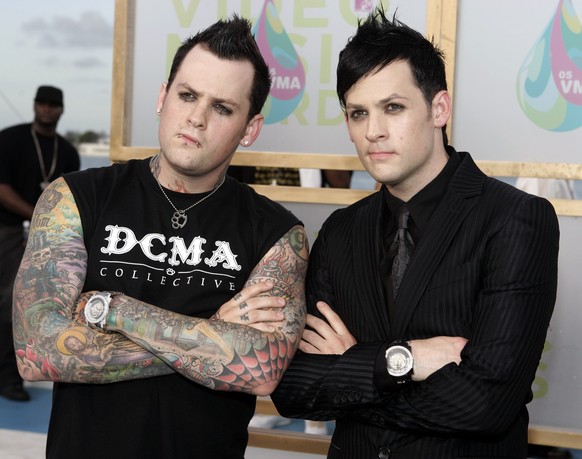 Benji Madden, left and Joel Madden of the band &quot;Good Charlotte&quot; arrive on the white carpet of the 2005 MTV Video Music Awards Sunday, Aug. 28, 2005 at the American Airlines Arena in Miami. ( ...