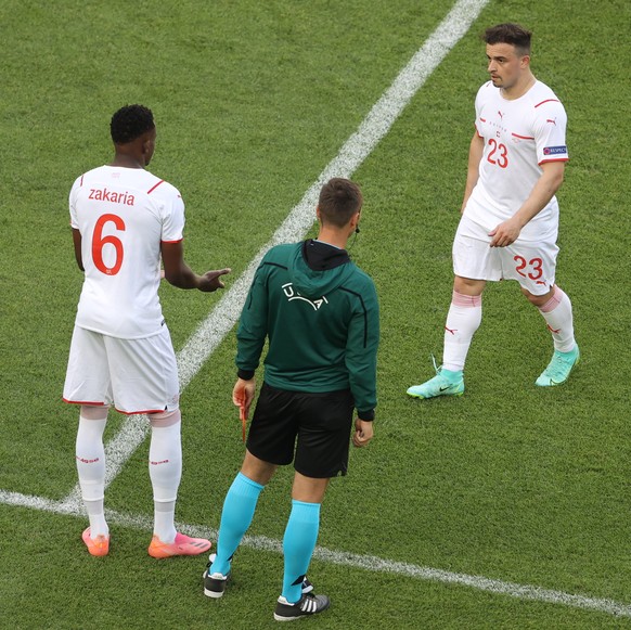 epa09264859 Xherdan Shaqiri (R) of Switzerland is replaced by Denis Zakaria of Switzerland during the UEFA EURO 2020 group A preliminary round soccer match between Wales and Switzerland in Baku, Azerb ...