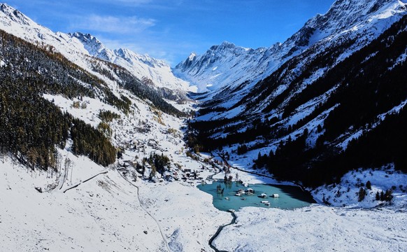 FILE - The partly flooded village of Blatten is visible months after a landslide destroyed the village in Blatten, Switzerland, Oct. 28, 2025. (AP Photo/Michael Probst, File)
Climate COP30
