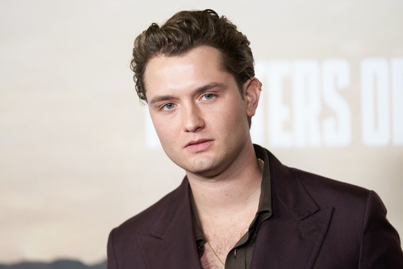 epa11068621 British actor Rafferty Law attends the &#039;Masters of the Air&#039; TV series premiere at the Regency Village Theatre in Westwood, California, USA, 10 January 2024. EPA/ALLISON DINNER