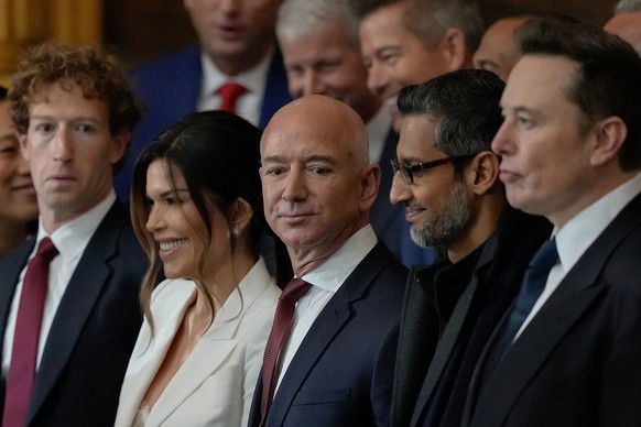 FILE - Guests including Mark Zuckerberg, from left, Lauren Sanchez, Jeff Bezos, Sundar Pichai and Elon Musk, arrive to attend the 60th Presidential Inauguration in the Rotunda of the U.S. Capitol in W ...