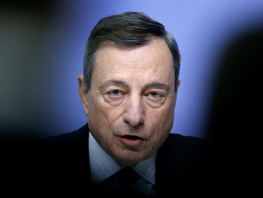 President of the European Central Bank Mario Draghi speaks during a news conference in Frankfurt, Germany, Thursday, Dec. 14, 2017. (AP Photo/Michael Probst)