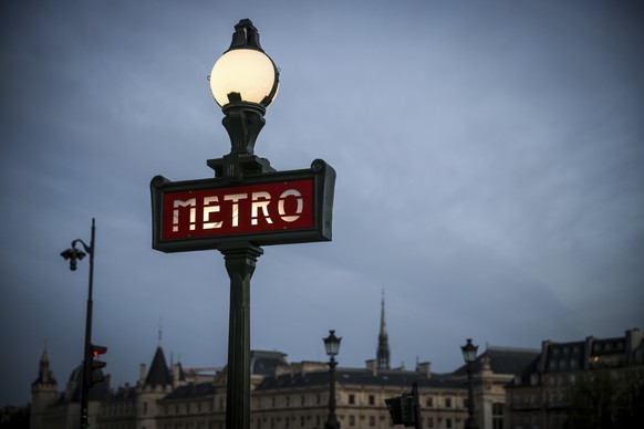 The sign at a metro station lights up in the early evening in Paris, Thursday, April 17, 2025. (AP Photo/Thomas Padilla)
Paris France