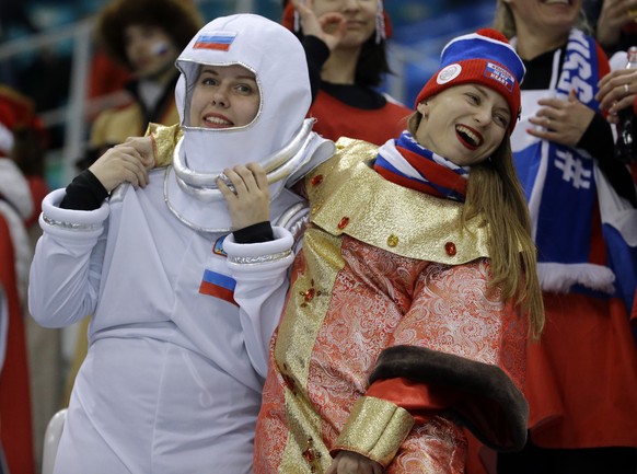 Fans wait before the semifinal round of the men&#039;s hockey game between the team from Russia and the Czech Republic at the 2018 Winter Olympics in Gangneung, South Korea, Friday, Feb. 23, 2018. (AP ...