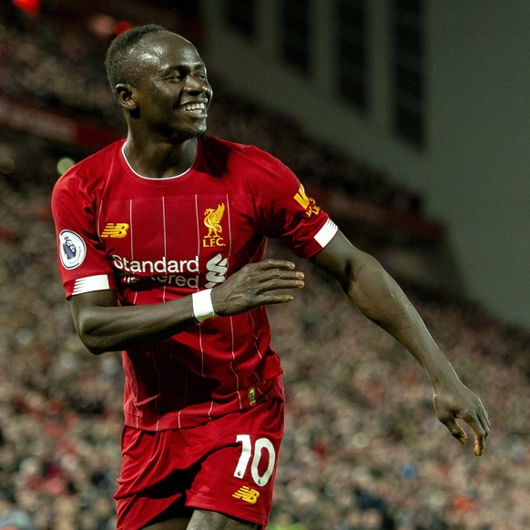 epa08099032 Liverpool's Sadio Mane celebrates after scoring the second goal during the English Premier League soccer match between Liverpool and Sheffield United at Anfield, Liverpool, Britain, 0 ...