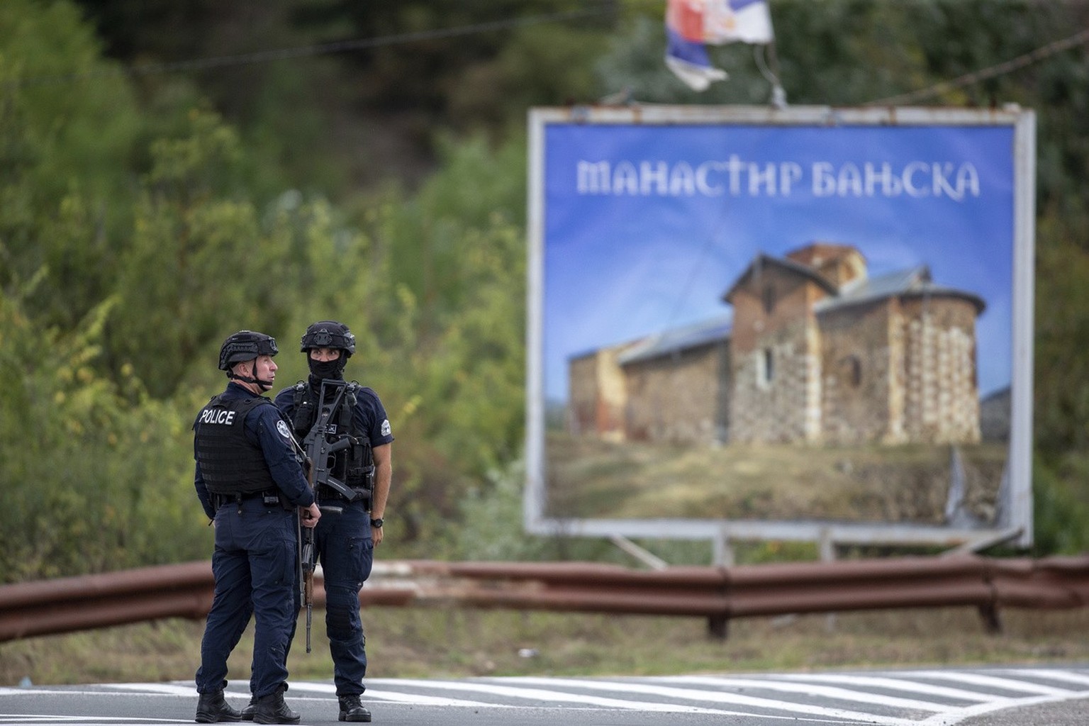 Kosovo police officers secure a cross road leading to the Banjska Monastery in the village of Banjska on Sunday, Sept.24, 2023. Kosovo&#039;s prime minister on Sunday said one police officer was kille ...