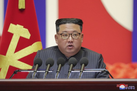 In this photo provided by the North Korean government, North Korean leader Kim Jong Un speaks during a &quot;maximum emergency anti-epidemic campaign meeting&quot; in Pyongyang, North Korea, Wednesday ...