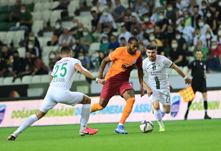 Alexis Perez 25 , Hayrullah Bilazer 77 of Giresunspor and Marcao of Galatasaray during the Turkish Super League footbll match between Giresunspor and Galatasaray at Cotanak Stadium in Giresun , Turkey ...