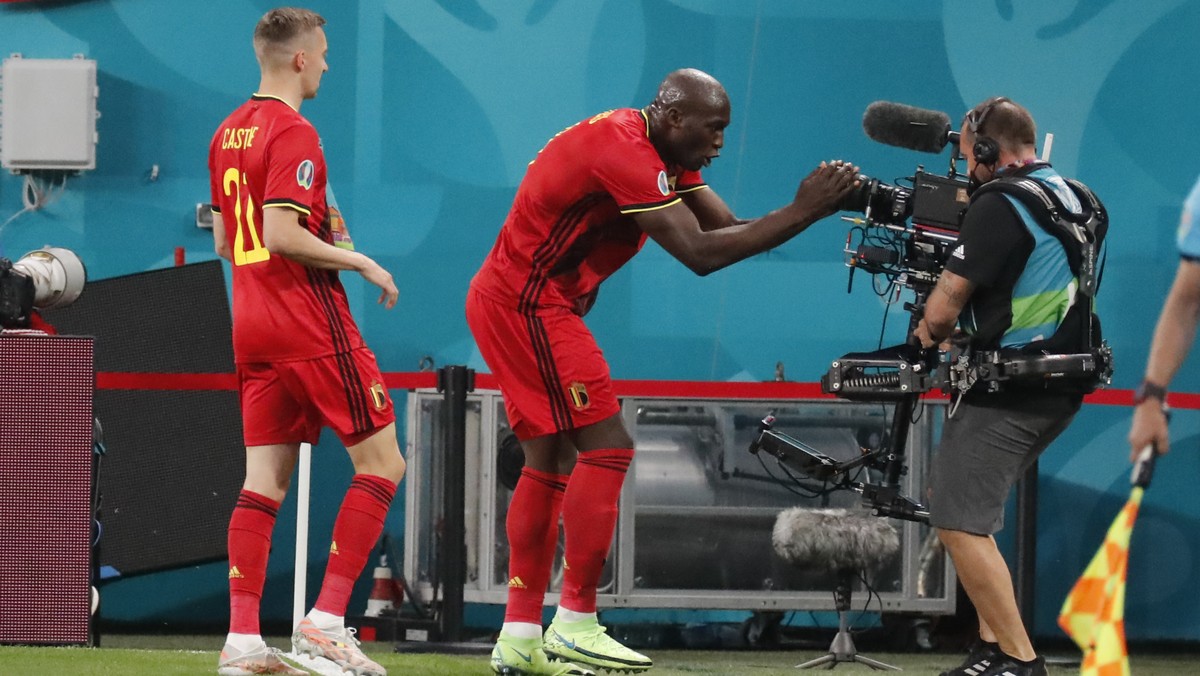 Belgium's Romelu Lukaku, right, celebrates after scoring his side's first goal during the Euro 2020 soccer championship group B match between Belgium and Russia at the Saint Petersburg stadi ...