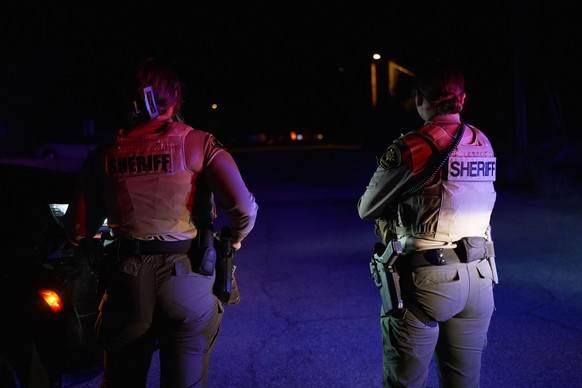 Sheriff's officials block the entrance to a road where a home was being searched in Rio Rico, Arizona, on Tuesday, Feb. 10, 2026, in connection to the investigation of Nancy Guthrie's disapp ...