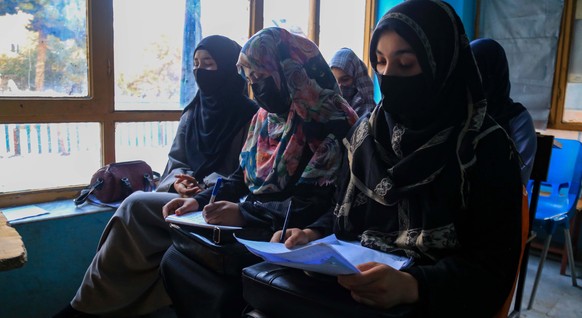epa10297445 Afghan girls take classes at Ekhlas Center, a private educational institution providing free education for nearly 2,000 female students above the sixth grade, in Kabul, Afghanistan, 09 Nov ...