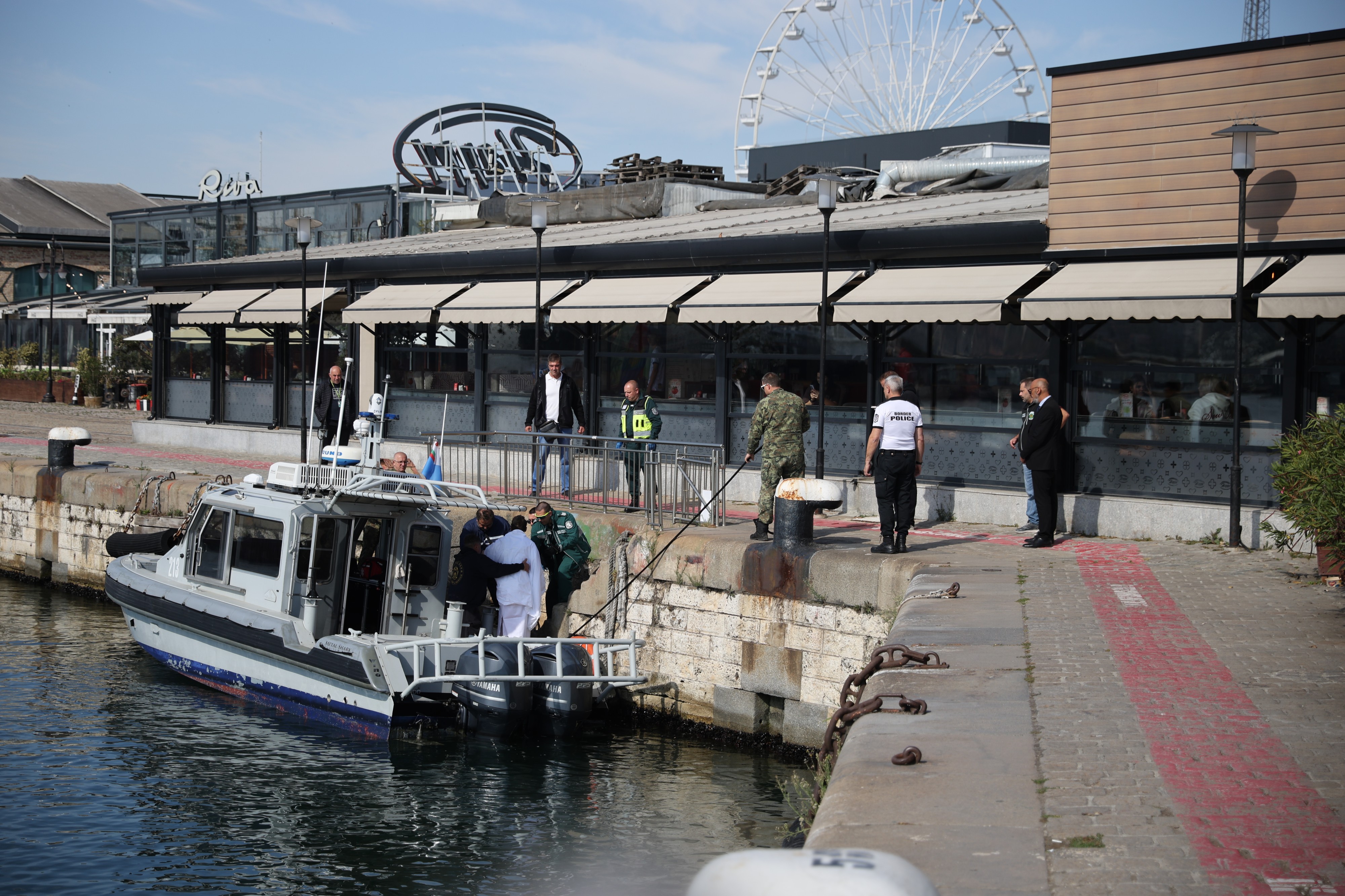 Bulgarian authorities take an injured crew member to a hospital after two commercial vessels were attacked in the NATO member's Black Sea economic zone on Tuesday, Oct. 6, 2026, Varna, in what wa ...
