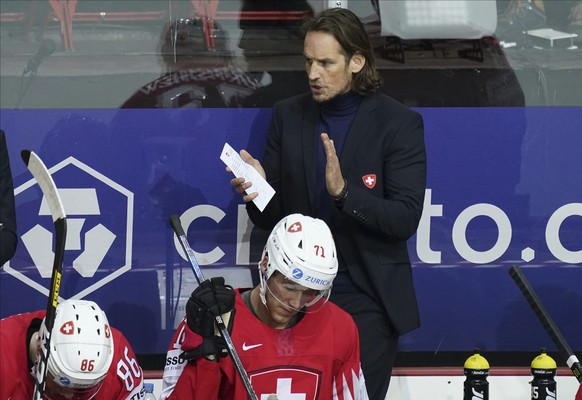 Switzerland&#039;s Head Coach Patrick Fischer reacts during the Ice Hockey World Championship group A match between Switzerland and Slovakia at the Olympic Sports Center in Riga, Latvia, Thursday, May ...