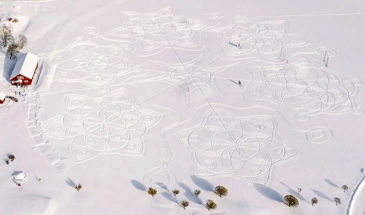 Part of a giant complex geometric pattern formed from thousands of footsteps in the snow near the capital Helsinki, in Espoo, Finland, Monday Feb. 8, 2021. The art work design measuring about 160 mete ...