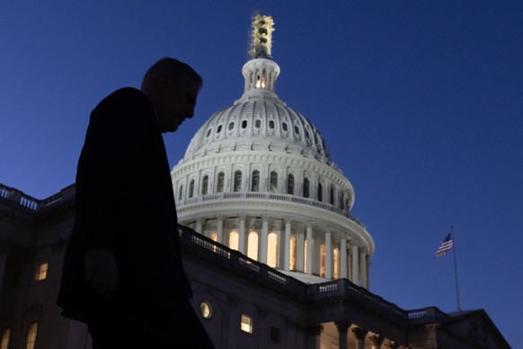 epa10915884 Republican Representative of California and former Speaker of the House Kevin McCarthy walks down the East Front steps of the US House of Representatives after attend a vigil for Israel wi ...