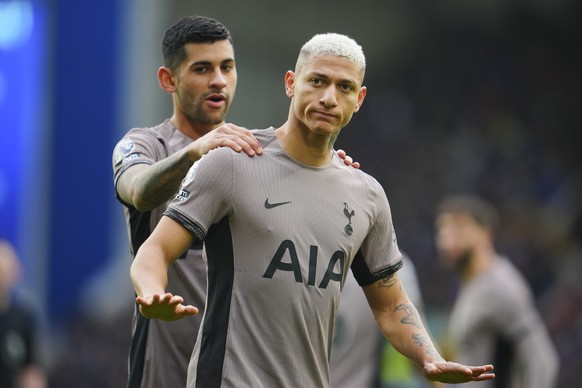 Tottenham&#039;s Richarlison celebrates after scoring his side&#039;s first goal during the English Premier League soccer match between Everton and Tottenham Hotspur, at the Goodison Park stadium, in  ...