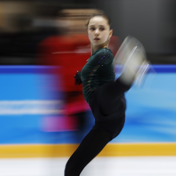epa09755083 Figure skater Kamila Valieva of the Russian Olympic Committee in action during a practice session at the Beijing 2022 Olympic Games, Beijing, China, 14 February 2022. The 15-year-old Russian skater who failed a pre-games drug test has been cleared to continue competing in the Women?s Single skating event in a ruling by a panel of arbitrators appointed by the Court of Arbitration for Sport on 14 February.  EPA/HOW HWEE YOUNG