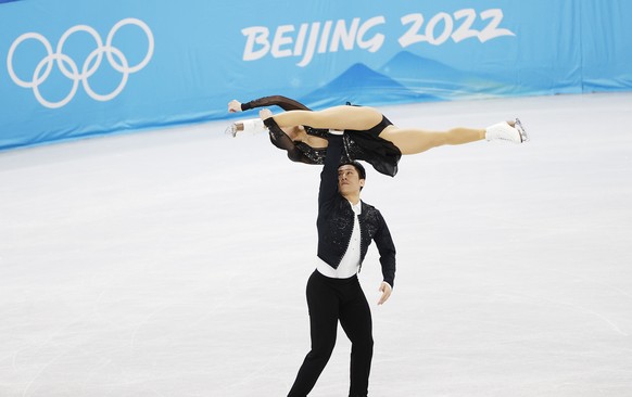 epa09726823 Cong Han (bottom) and Wenjing Sui (top) of China in action during the Pair Skating - Short Program of the Figure Skating Team Event at the Beijing 2022 Olympic Games, Beijing, China, 04 Fe ...