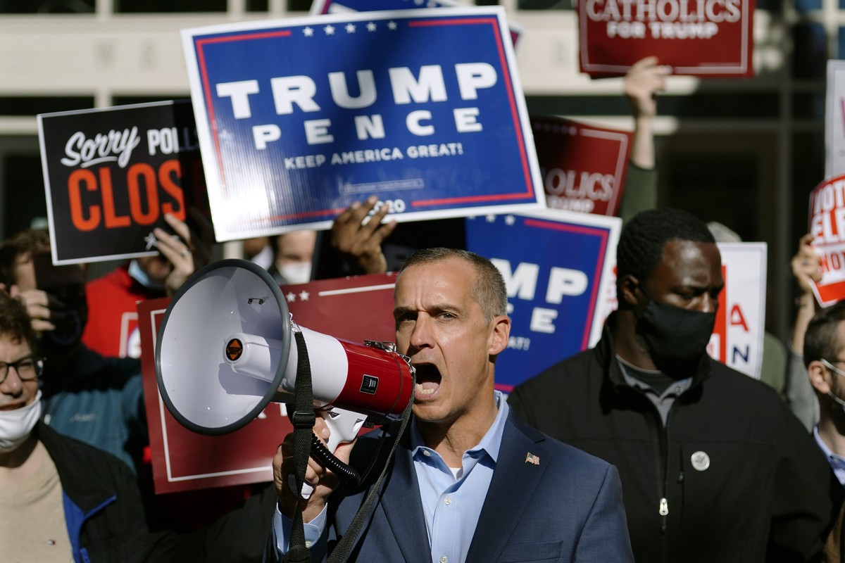 President Donald Trump's campaign advisor Corey Lewandowski, center, speaks about a court order obtained to grant more access to vote counting operations at the Pennsylvania Convention Center, Th ...
